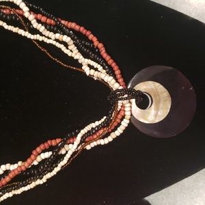 Multi strand bead and shell necklace